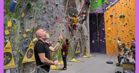 belaying rock climbers